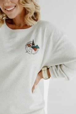 Best deal 👏 Pink Lily Adventure Awaits Heather Sand Graphic Sweatshirt ⭐ -Tees Shop Image 76b0f6d0 5eec 4156 9696 2fabc4f4f4b0 650x